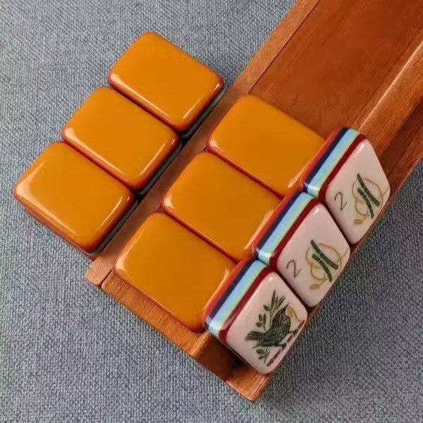 Amber blank tiles and wooden mahjong rack